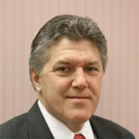 Headshot of a businessman smiling